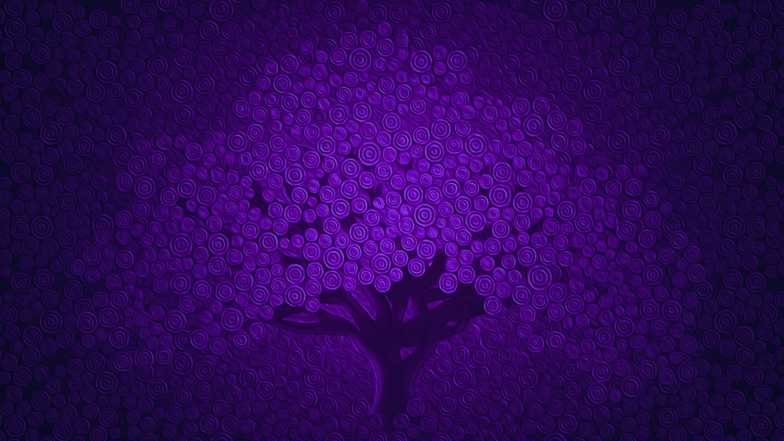 Purple tree composed of Goaloop's goal symbol, three concentric circles